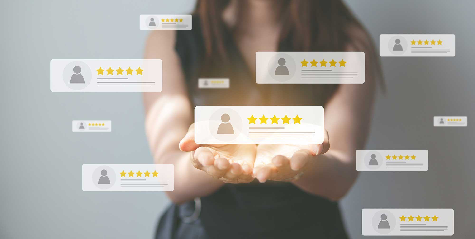 woman holding out hands with graphics of customer reviews